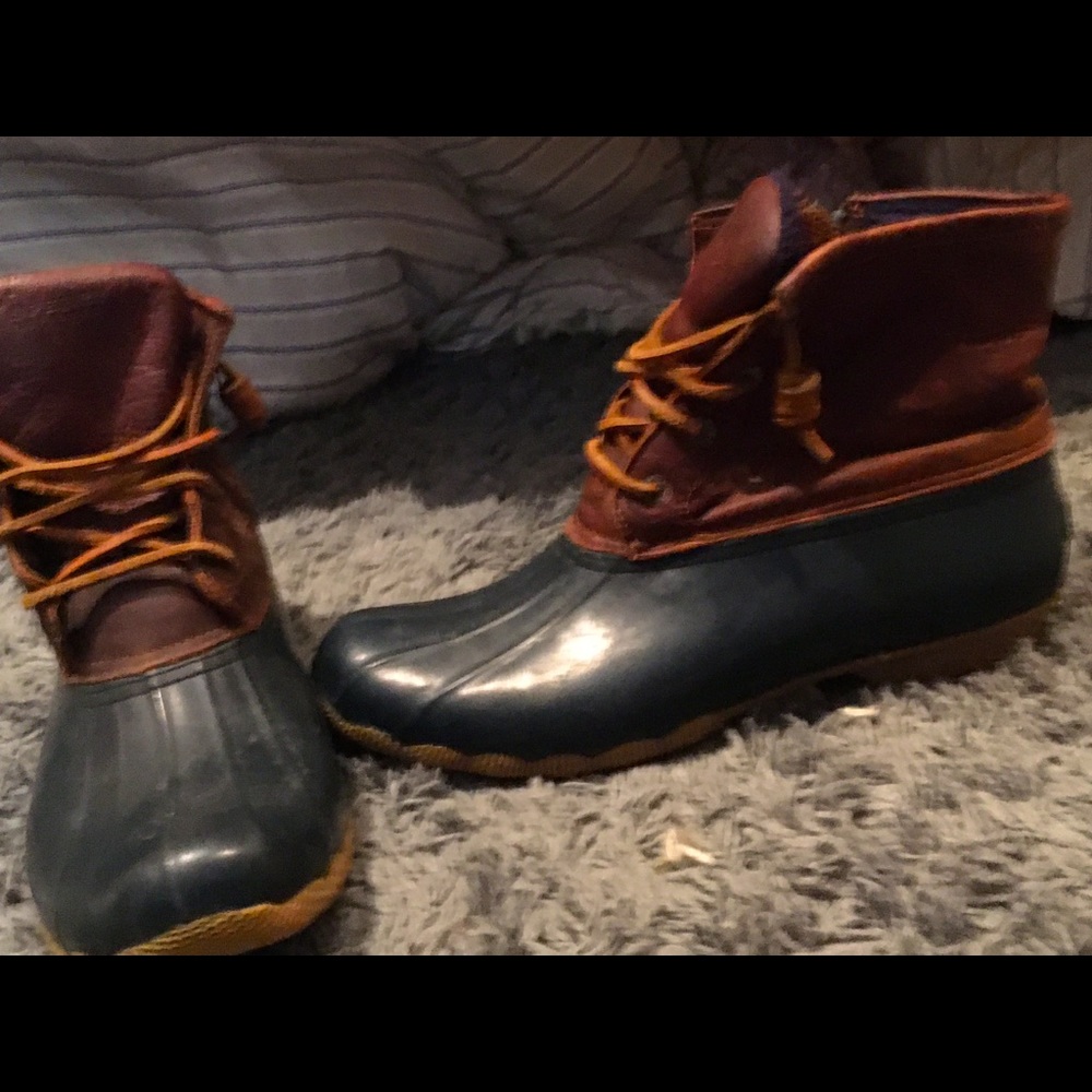 Worn Sperry duck boots